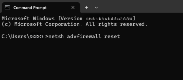 An Administrator Command Prompt window with the command netsh advfirewall reset entered at the prompt.