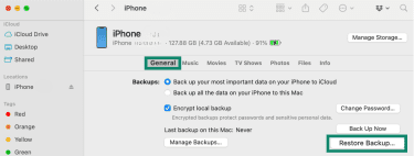 iPhone section on Mac Finder app with General and Restore Backup highlighted.