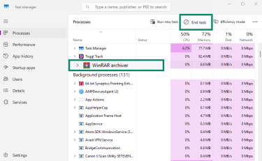 Task Manager open with WinRAR archiver and End task highlighted
