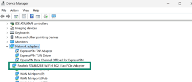 The Windows 11 device manager is open, the network adapters section is open and the Realtek adapter is highlighted, showing the computer HAs WI-fI 6